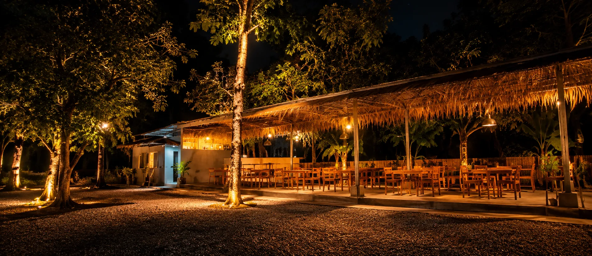 A side view of the seating area among the trees